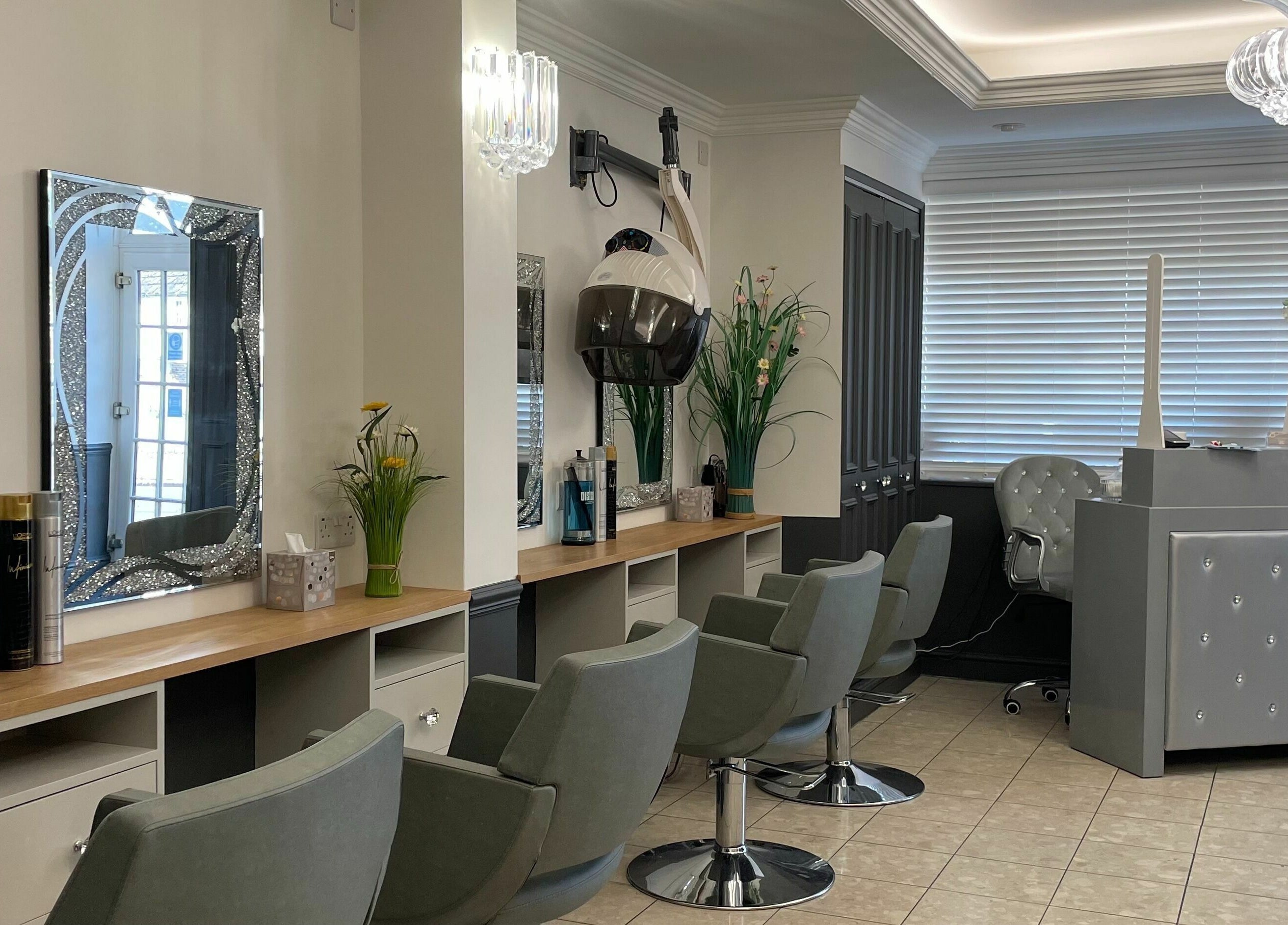 Corner Hairdressing salon in Lindfield, England, GB features modern styling chairs and elegant decor.