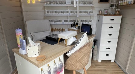 Natalies Paint Box Nails cozy workspace with nail polish display in Birmingham, England, GB.
