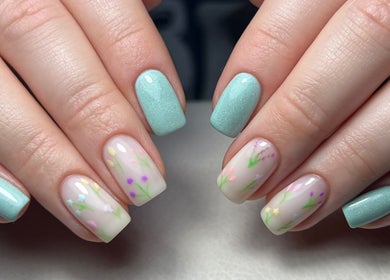 Elegant floral and mint nail art at Natalies Paint Box Nails in Birmingham, England, GB.
