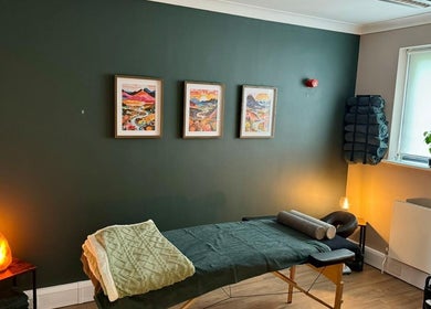 Tranquil therapy room at Nourish Holistic Therapy, Milton Keynes, England, GB, with massage table and calming decor.
