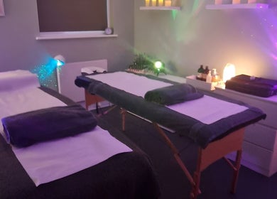 Serene therapy room at Nourish Holistic Therapy in Milton Keynes, England, GB with cozy massage tables.