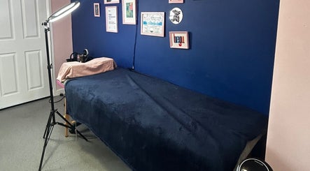 Cozy massage bed at Alexander Aromatics Wellness Studio, Dreghorn, Scotland, GB.