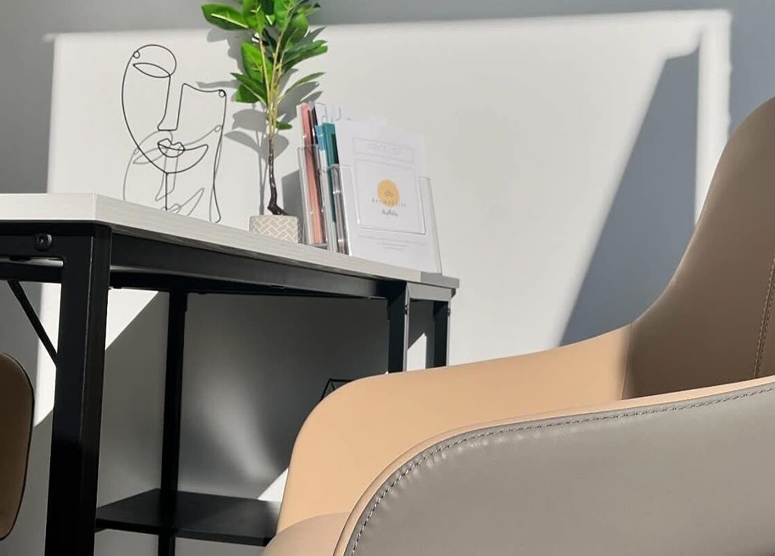 Cozy seating and desk at Alexander Aromatics Wellness Studio, Girdle Toll, Scotland, GB.