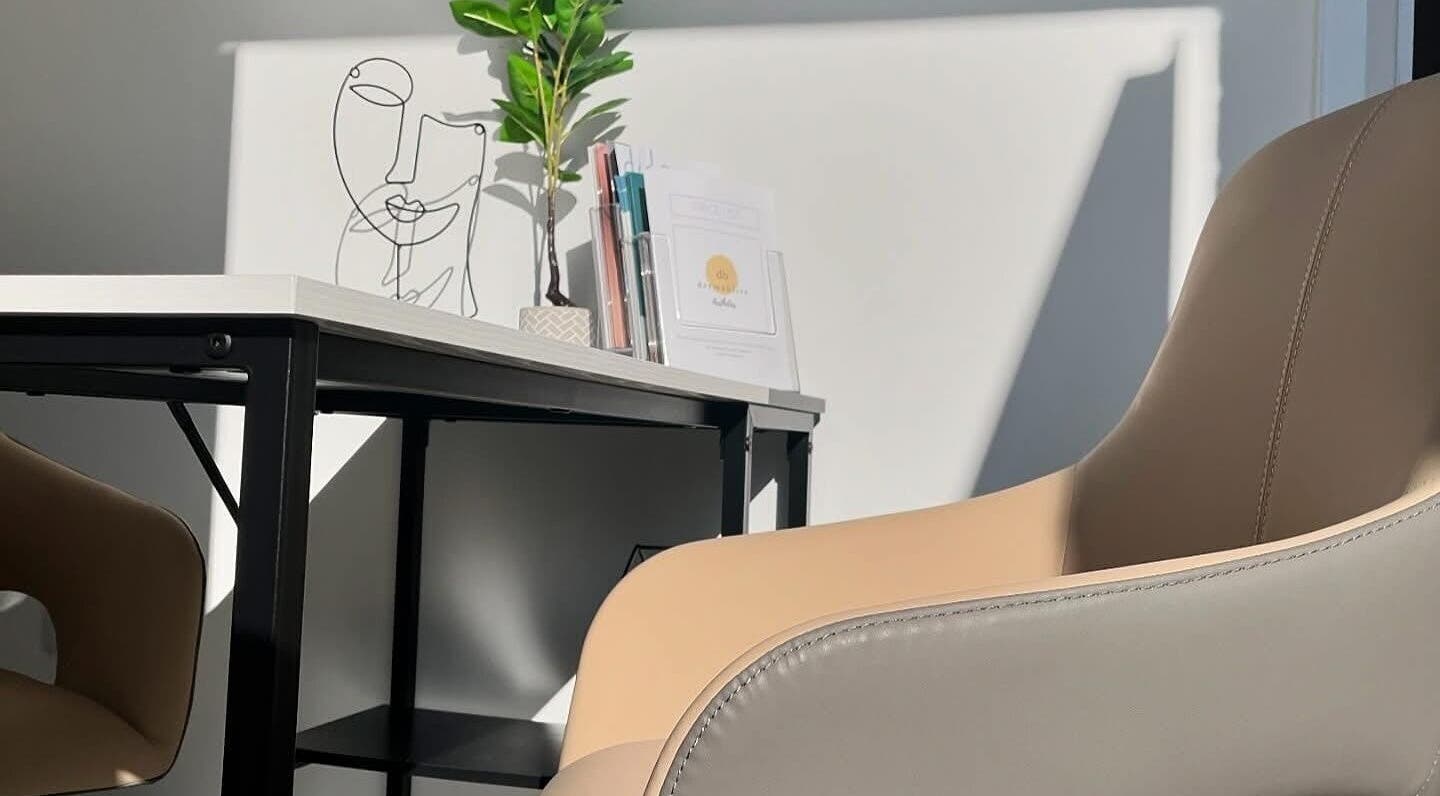 Cozy seating and desk at Alexander Aromatics Wellness Studio, Girdle Toll, Scotland, GB.