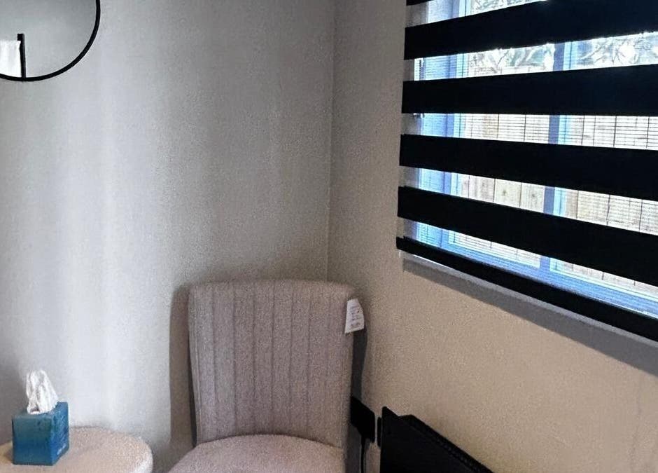 Serene corner with plush chair and decor at Alexander Aromatics Wellness Studio, Girdle Toll, Scotland, GB.