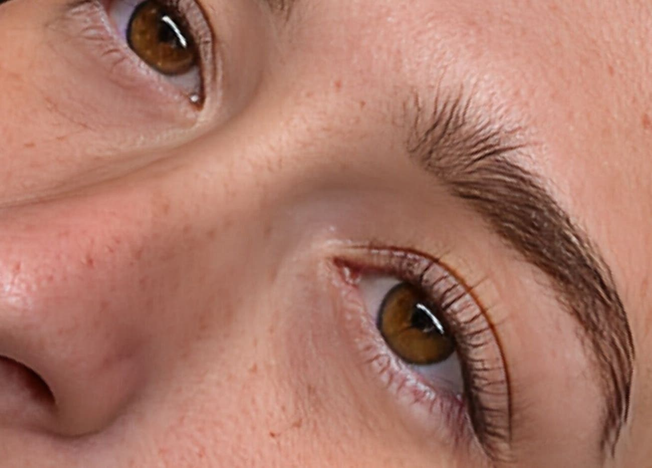 Close-up of expertly shaped brows at Dolled Upleeds, Morley, England, GB, showcasing skilled makeup artistry.