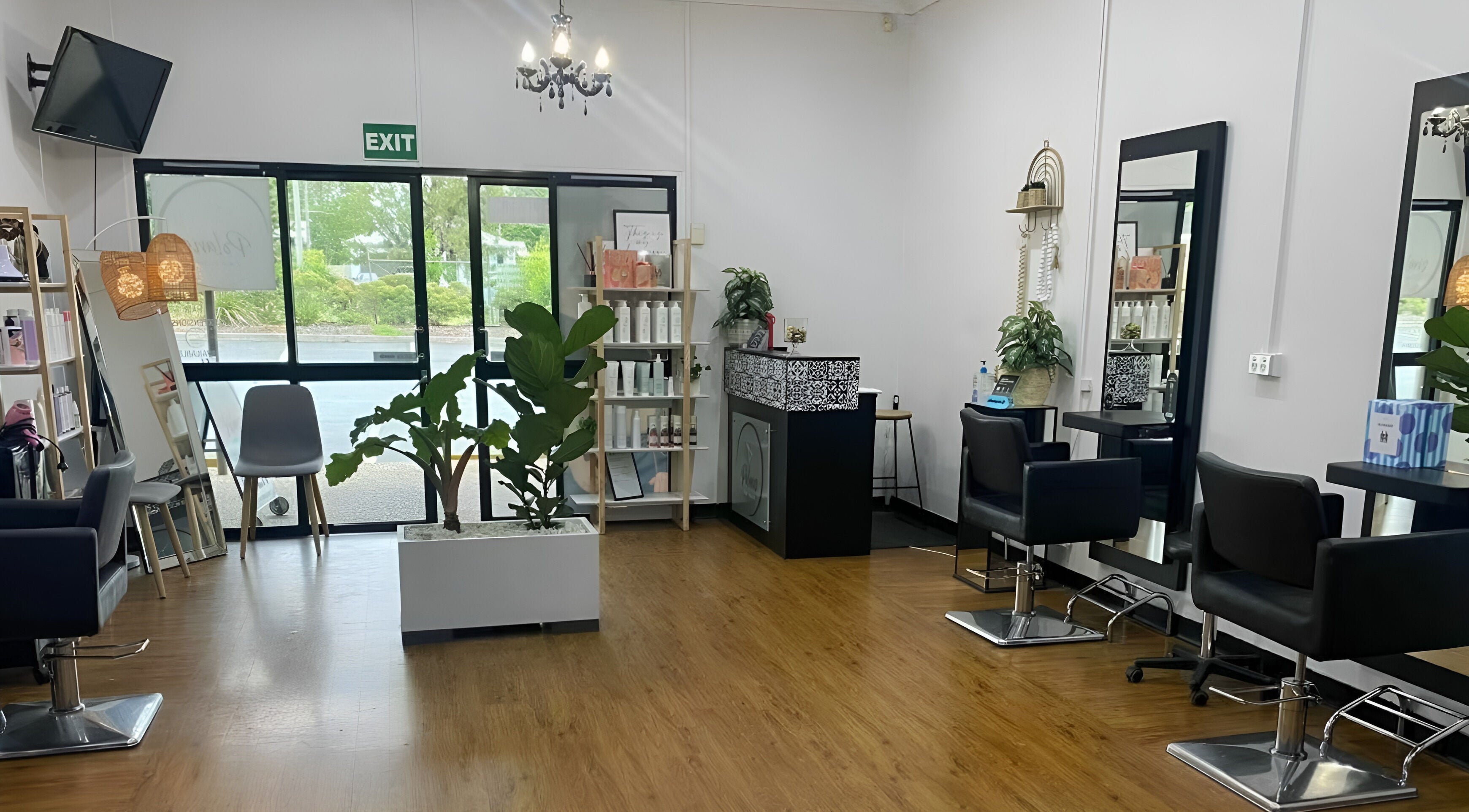 Interior of Polaris Hair Salon Raceview, Raceview, Queensland, AU showcasing stylish decor and modern furnishings.