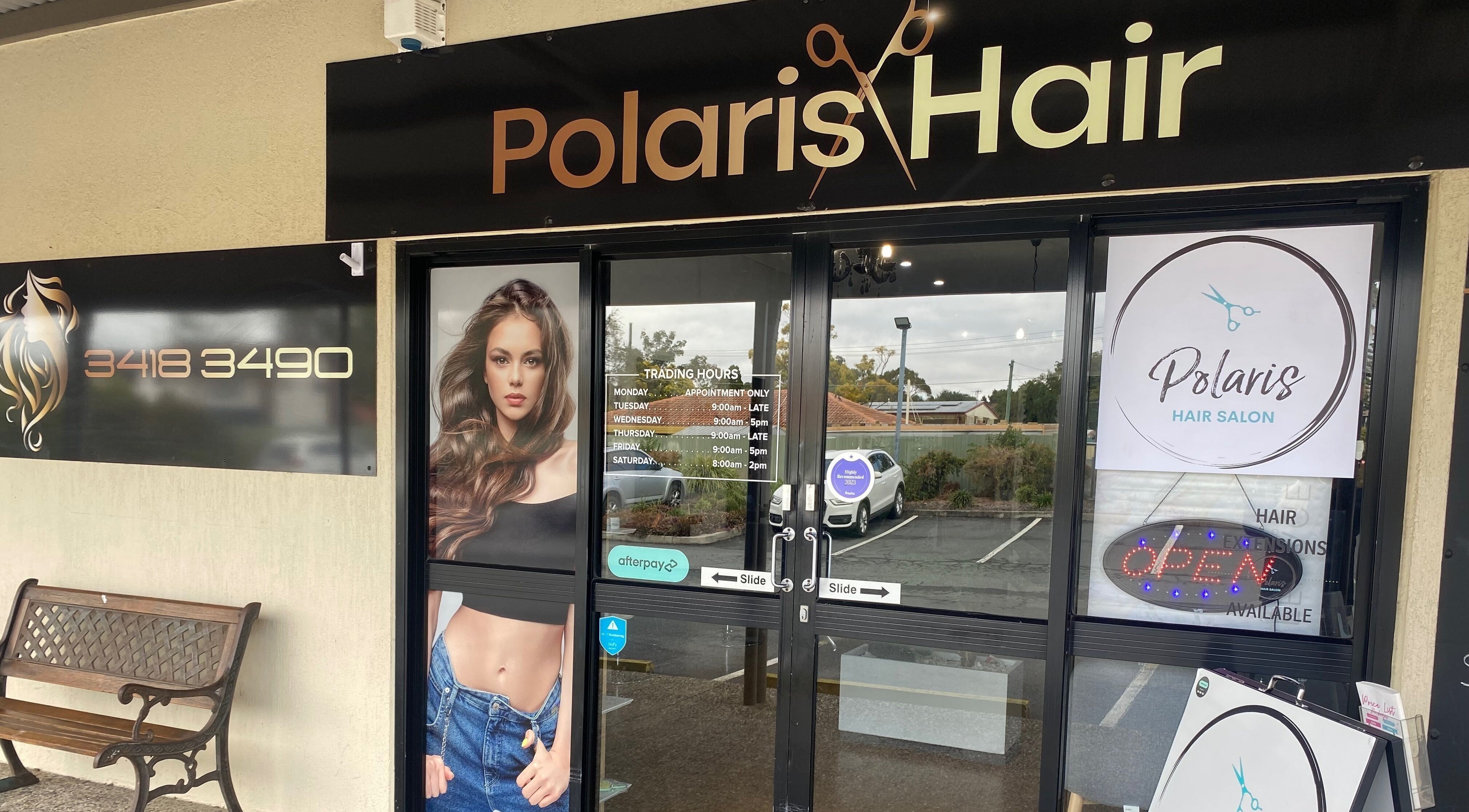 Entrance of Polaris Hair Salon Raceview with signage and glass doors in Raceview, Queensland, AU.