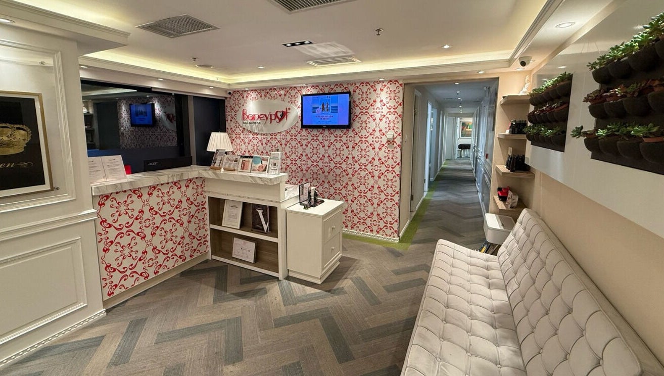 Welcome area of Honeypot Wax Boutique (Central) on Hong Kong Island, HK, featuring chic decor and a cozy ambiance.