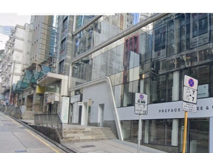 Street view of Honeypot Wax Boutique (Central) on Hong Kong Island, HK with modern glass facade.