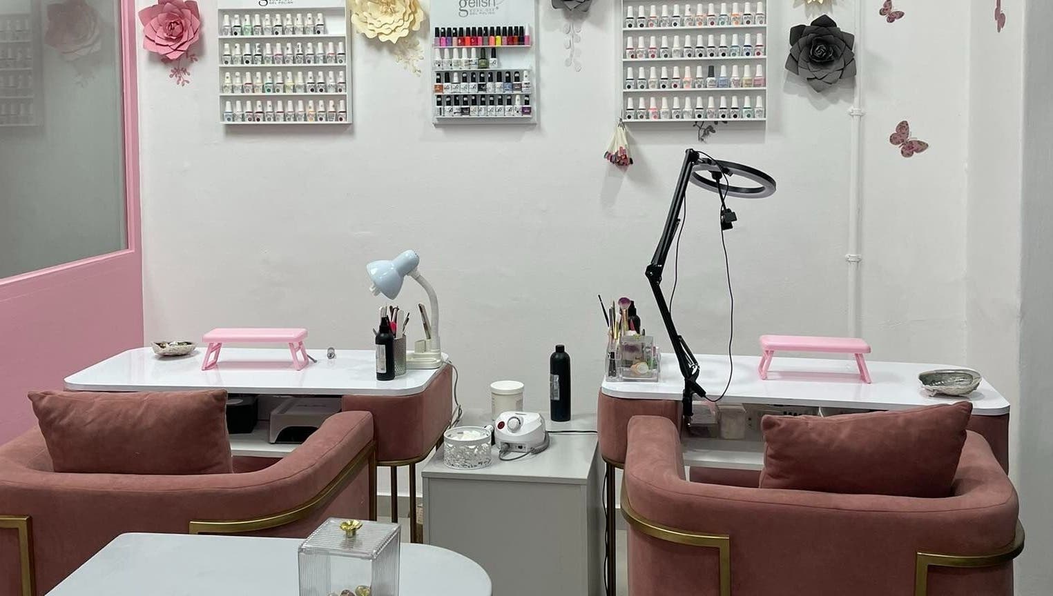 Modern nail station at Nails and Lashes by Merilyn, Cape Town, Western Cape, ZA, showcasing elegant decor.