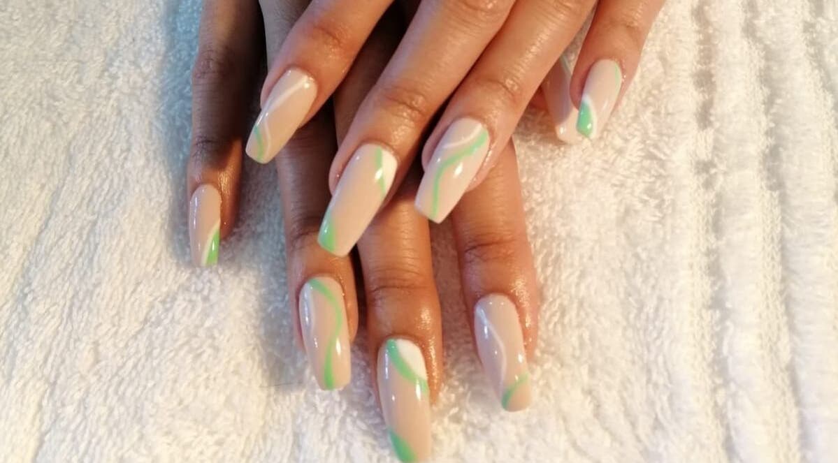 Stylish manicure with wave design at Nails and Lashes by Merilyn, Cape Town, Western Cape, ZA.
