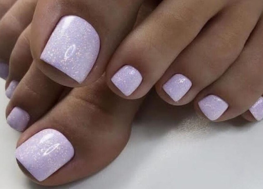 Lilac polish pedicure at Nails and Lashes by Merilyn, Cape Town, Western Cape, ZA.