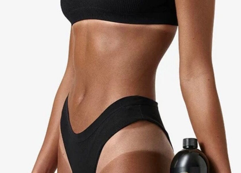 Toned body wearing black swimwear at Haven Beauty Clinic, Nenagh, County Tipperary, IE.