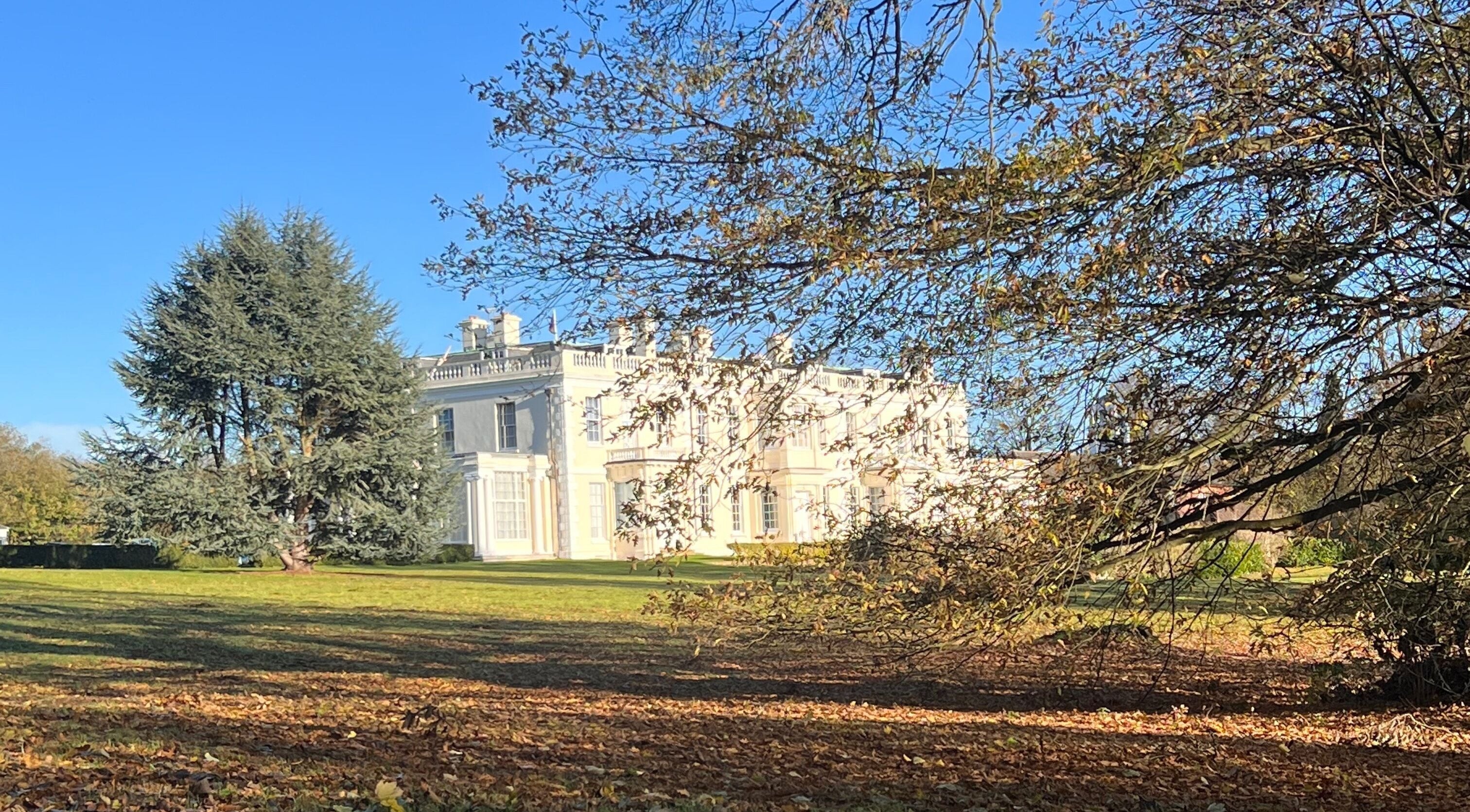 Elegant countryside estate of Chill Well-Being, Maidstone, England, GB surrounded by lush greenery.