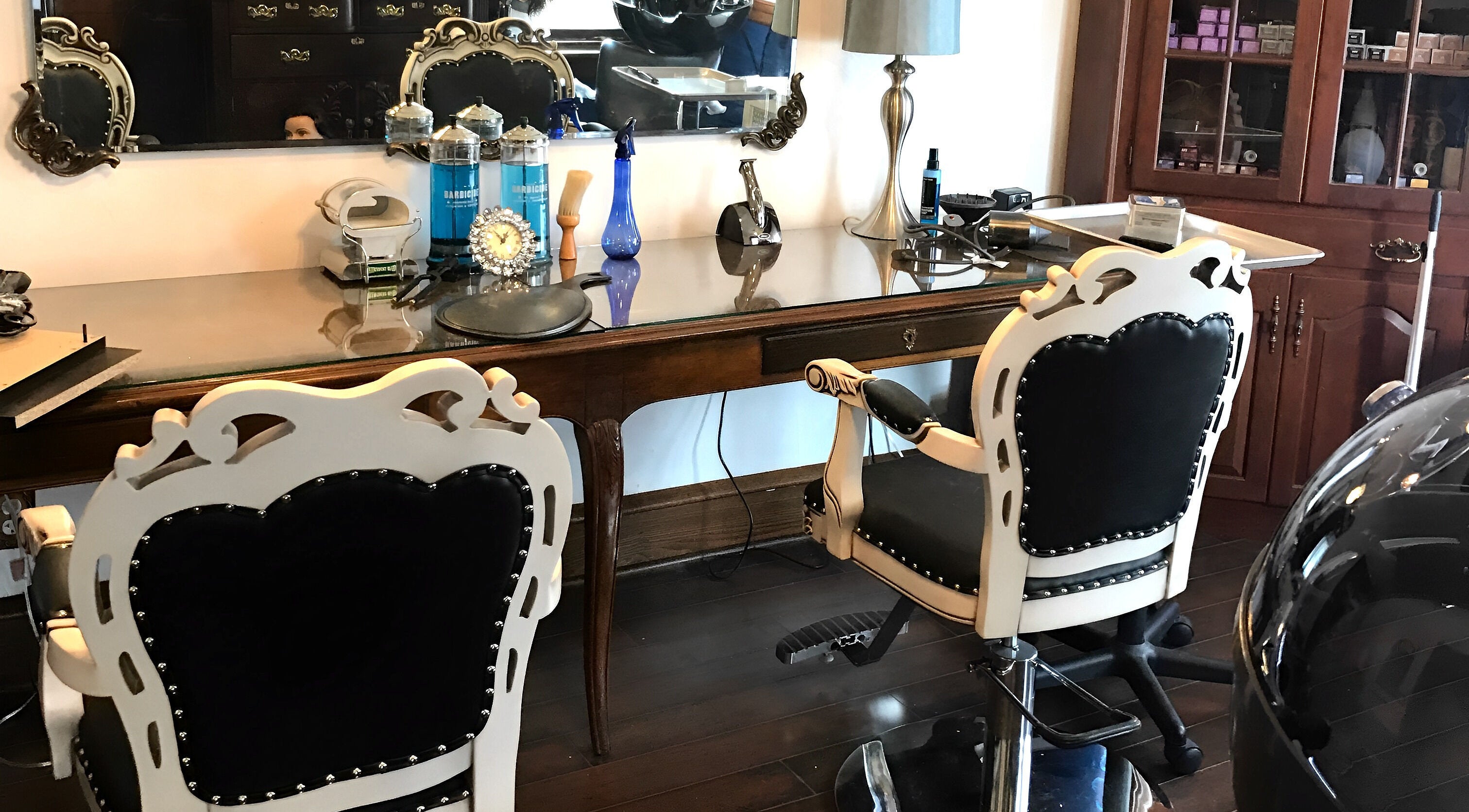 Luxurious salon chairs in TKM Hair Design and Restorations, Reading, Pennsylvania, US, enhance your beauty experience.