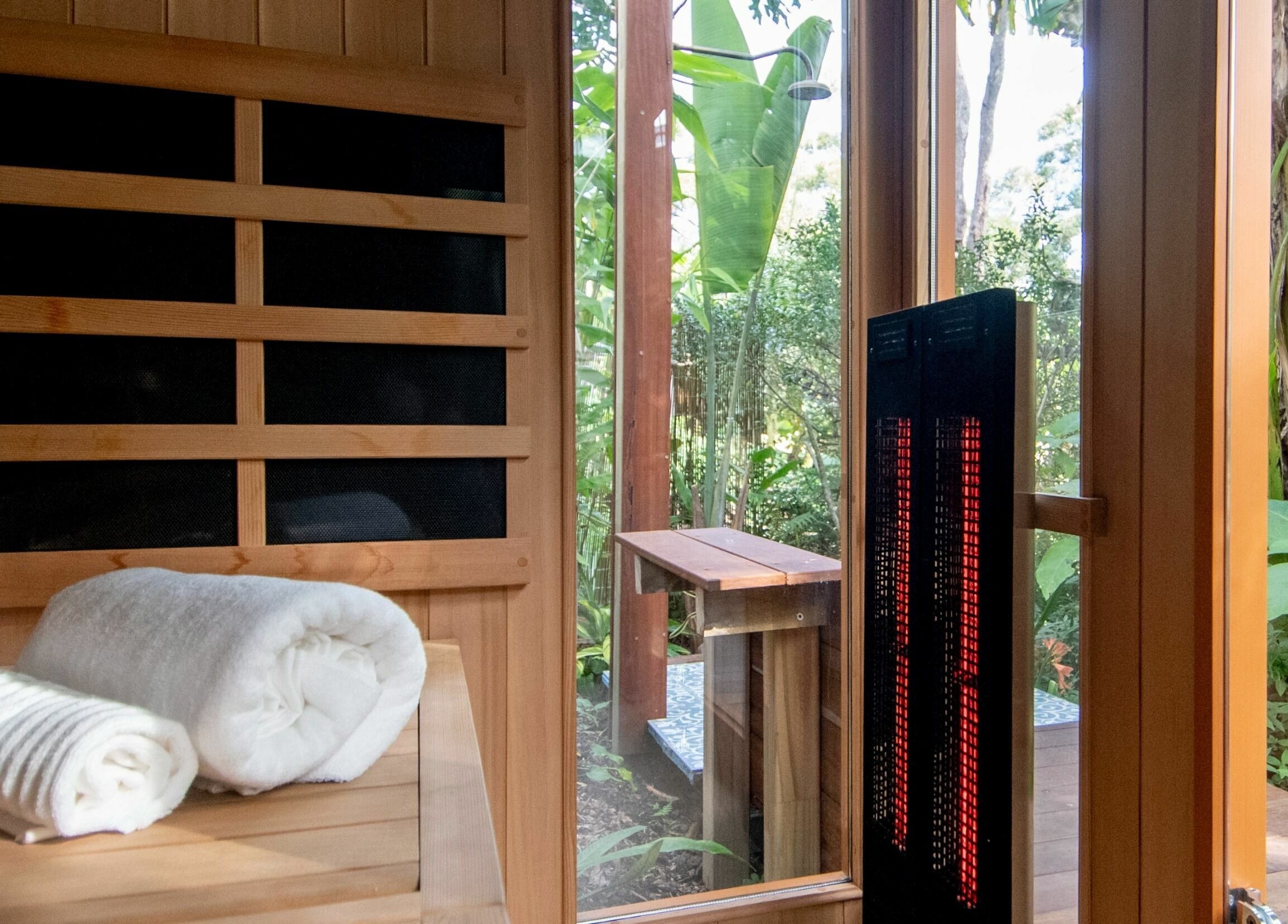 Relaxing sauna view at Cloud 9 Sauna, Macmasters Beach, New South Wales, AU, featuring nature and warmth.