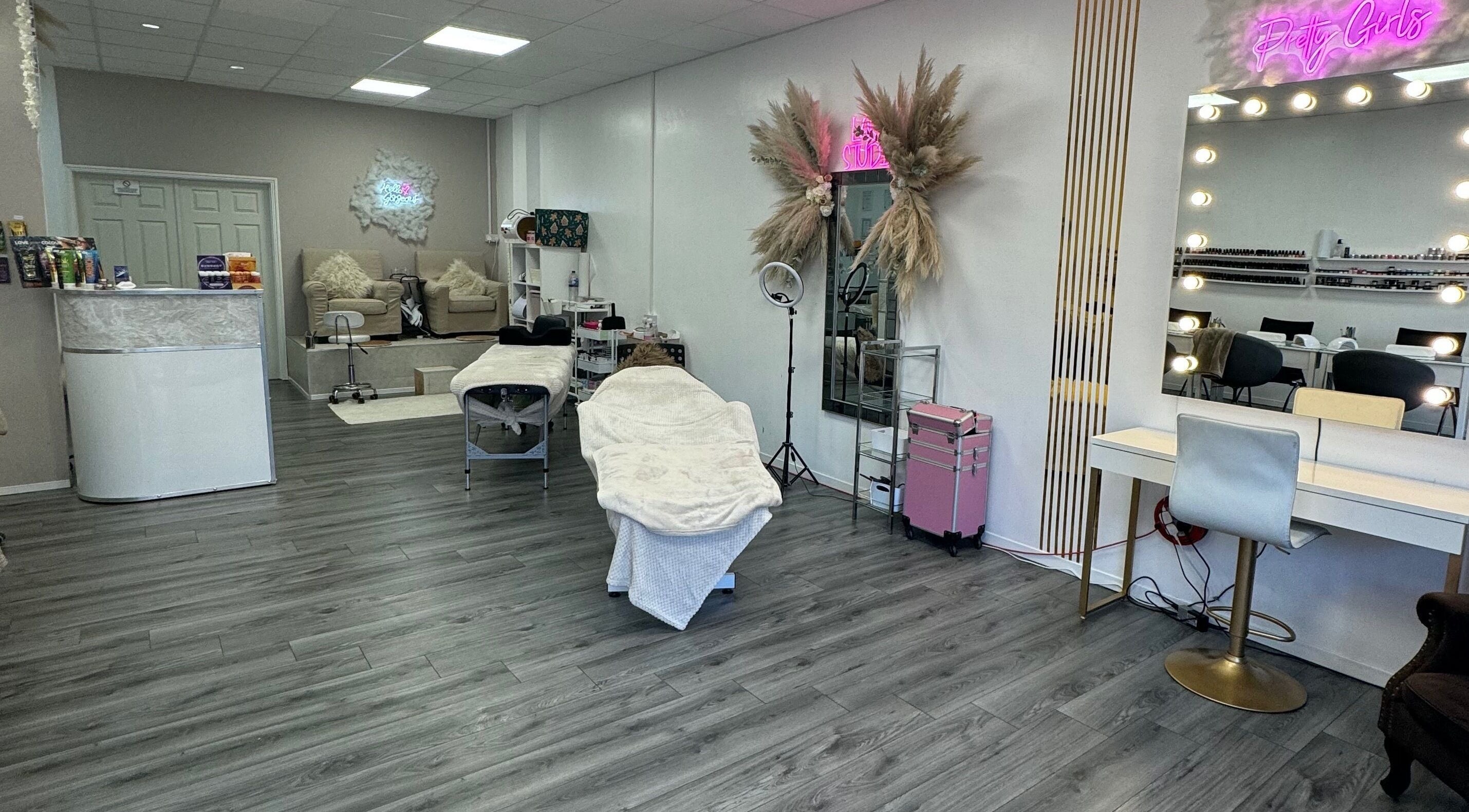 Interior of CJP Nail And Beauty Bar in Havant, England, GB with stylish decor and beauty stations.