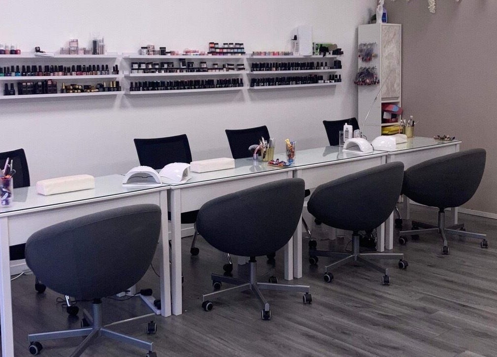 Modern nail station at CJP Nail And Beauty Bar, Havant, England, GB showcasing elegant design and nail products.