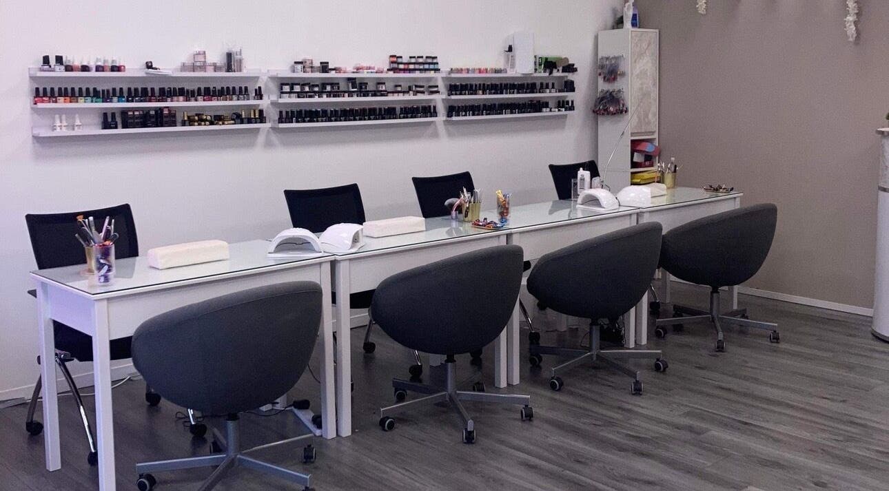 Modern nail station at CJP Nail And Beauty Bar, Havant, England, GB showcasing elegant design and nail products.