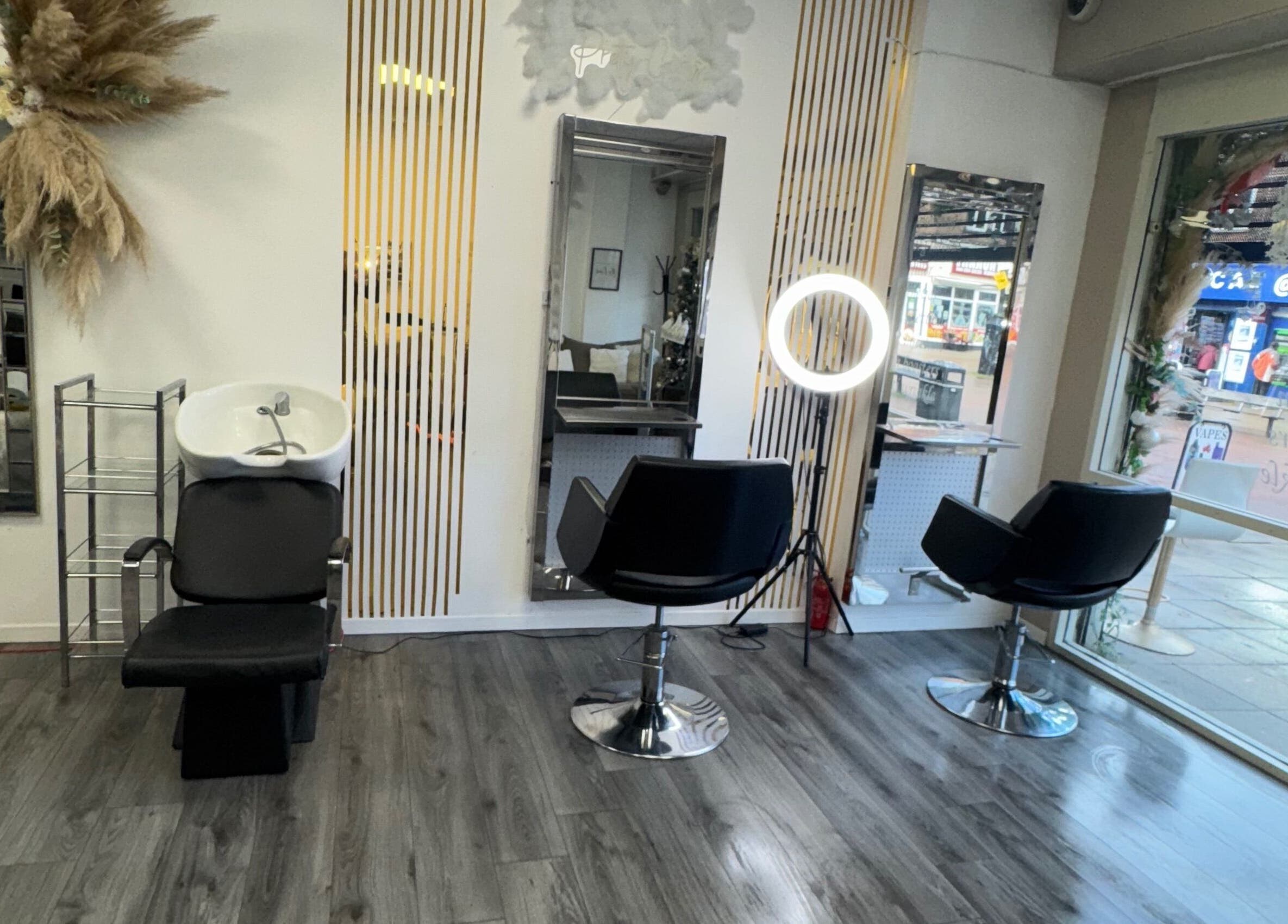 Sleek interior of CJP Nail And Beauty Bar with styling chairs in Havant, England, GB.