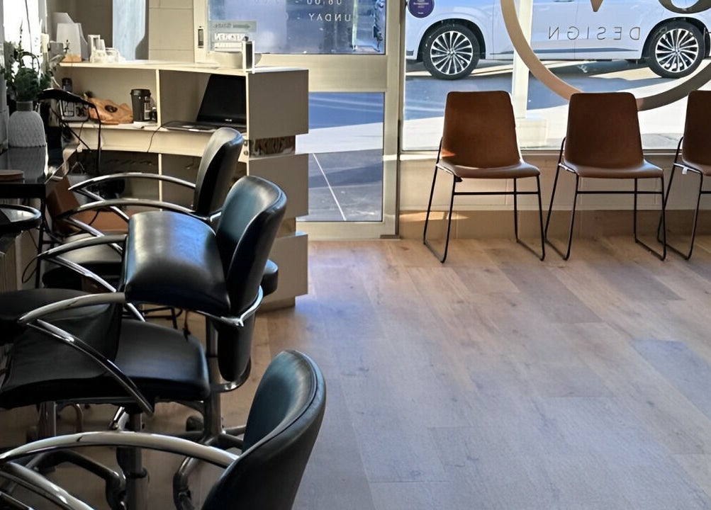 Stylish interior of SV Hair Design in Gladstone Central, Queensland with sleek salon chairs and a welcoming atmosphere.