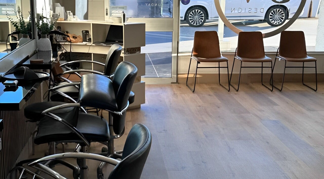 Stylish interior of SV Hair Design in Gladstone Central, Queensland with sleek salon chairs and a welcoming atmosphere.