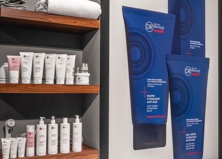 Premium skincare display at Scissors & Razors, Dubai, AE featuring high-end products.