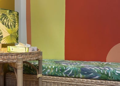Colorful tropical-themed decor at Shep Sports Massage, London, England, GB, highlighting vibrant relaxation space.
