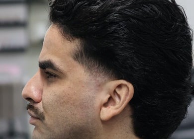 Corte masculino elegante en Loon Salon, San Juan, San Juan, PR para realzar estilo personal.