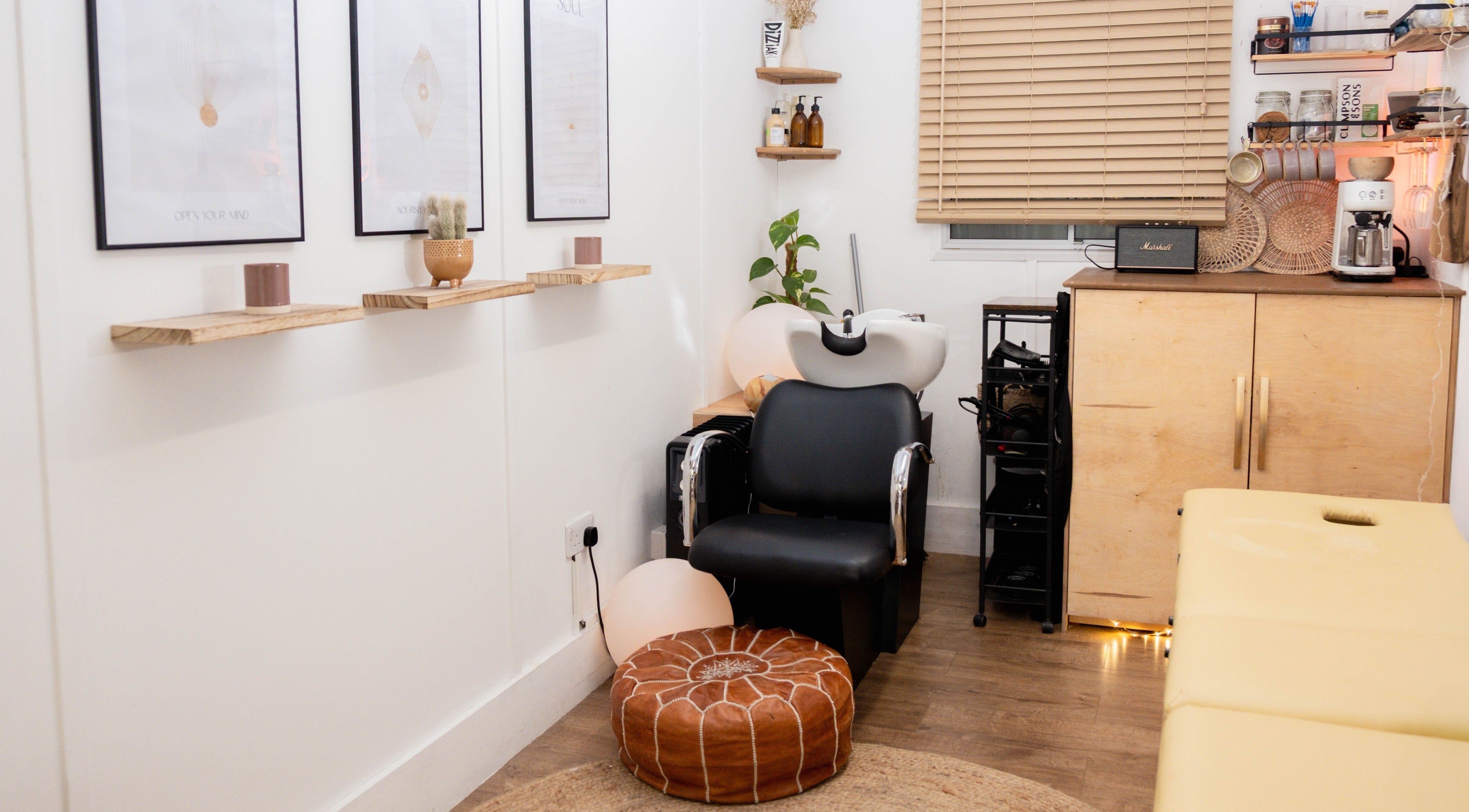 Chic salon corner at Leia Loves, London, England, GB, featuring a modern chair and elegant decor.
