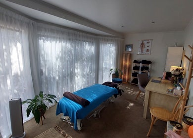 Relaxing massage room at Prime Massage Therapy (West Auckland), Auckland, NZ with a calming ambiance and massage table.