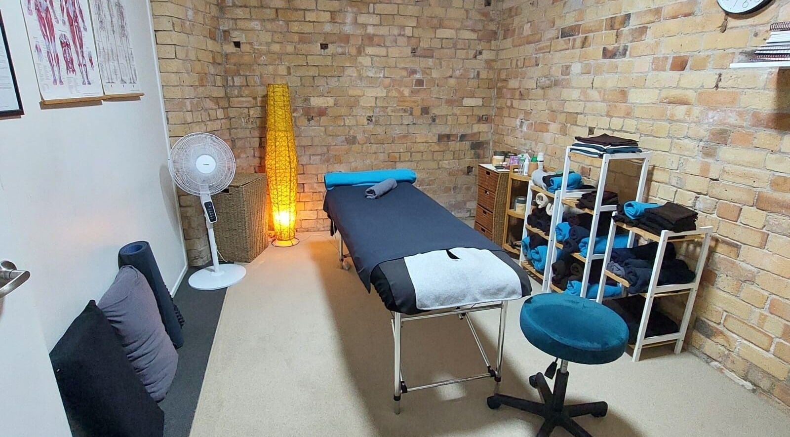 Cozy massage room at Prime Massage Therapy (Onehunga), Auckland, NZ with a bed and calming decor.