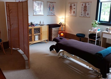 Cozy massage room at Prime Massage Therapy (West Auckland), Auckland, NZ, featuring a therapeutic ambiance.