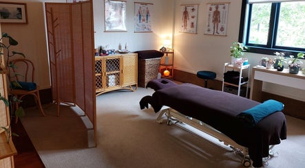 Cozy massage room at Prime Massage Therapy (West Auckland), Auckland, NZ, featuring a therapeutic ambiance.