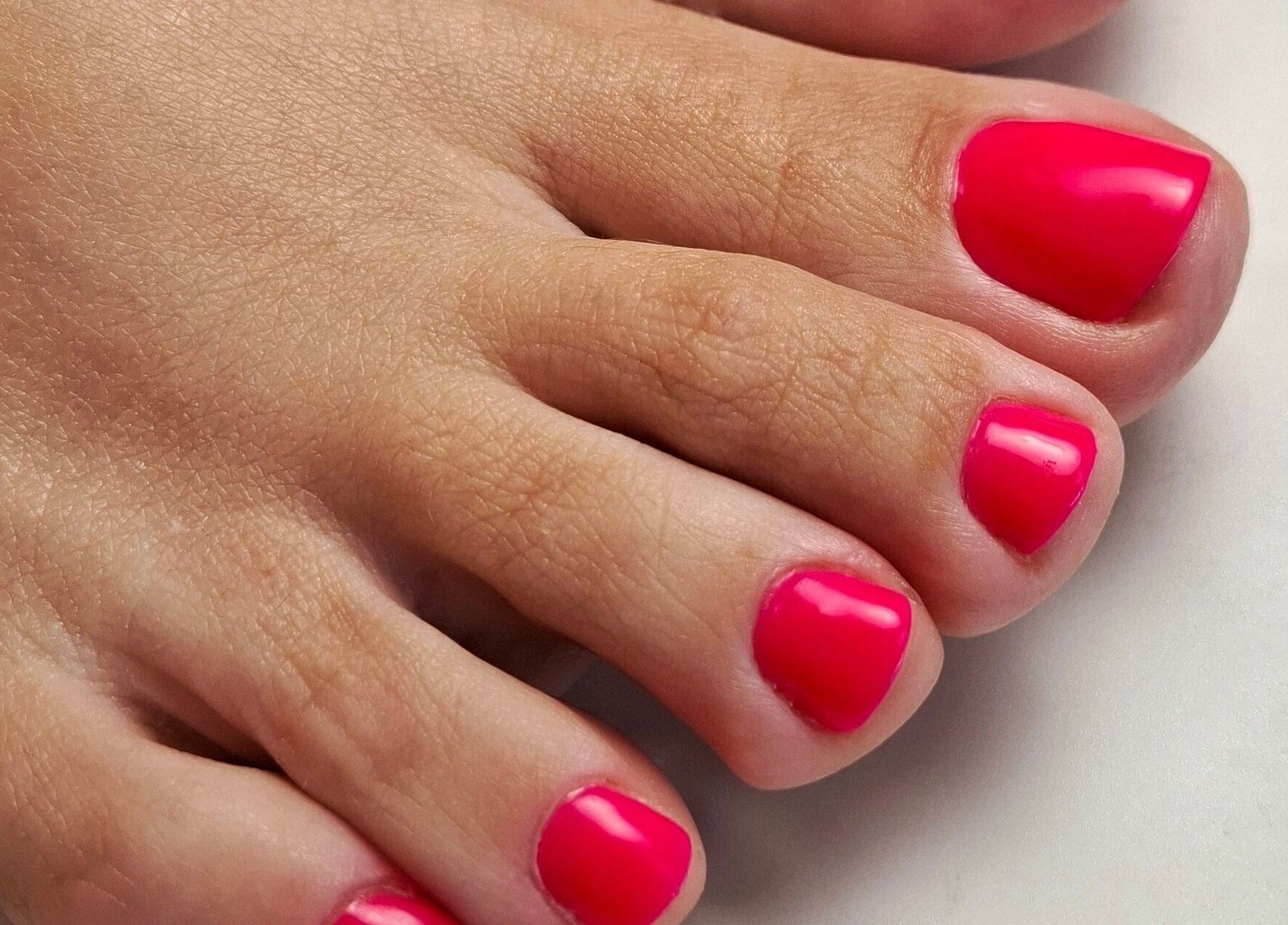 Bright pink pedicure at Starry Moon Beauty Swords, Swords, County Dublin, IE, highlighting nail care elegance.