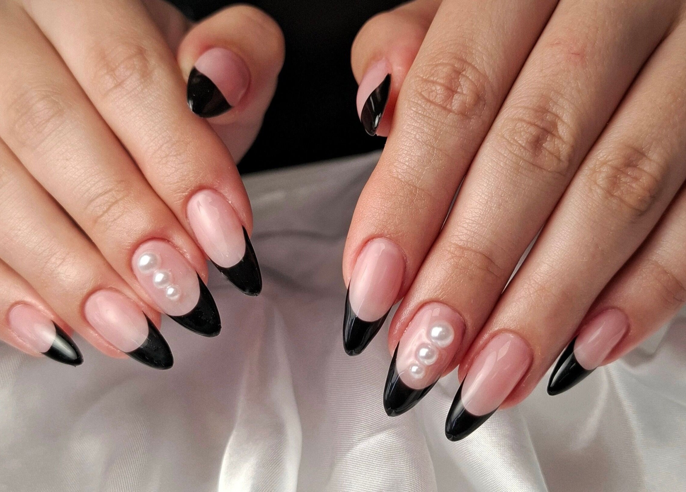 Elegant black and nude nails with pearls at Starry Moon Beauty Swords, Swords, County Dublin, IE.