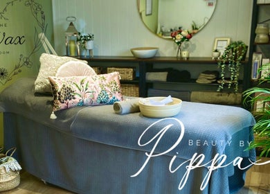 Relaxing treatment room at Pippa Hutchison Beauty & Training in Burton upon Trent, England, GB with floral decor.