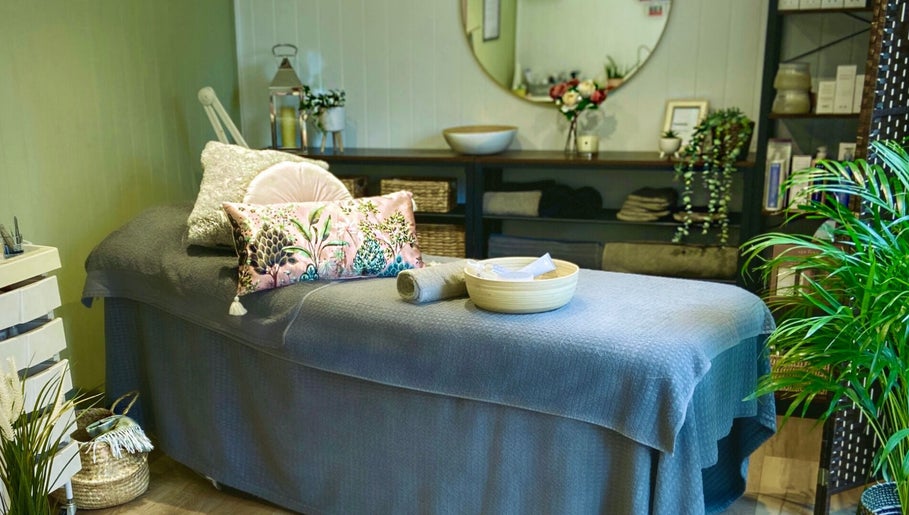 Calming spa room at Beauty by Pippa in Burton upon Trent, England, GB with a plush massage table and elegant decor.
