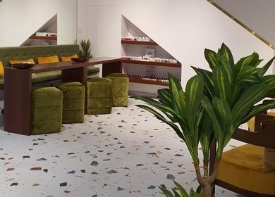 Chic interior of Shamsa Beauty Salon in Sharjah, AE featuring plush seating and stylish decor.