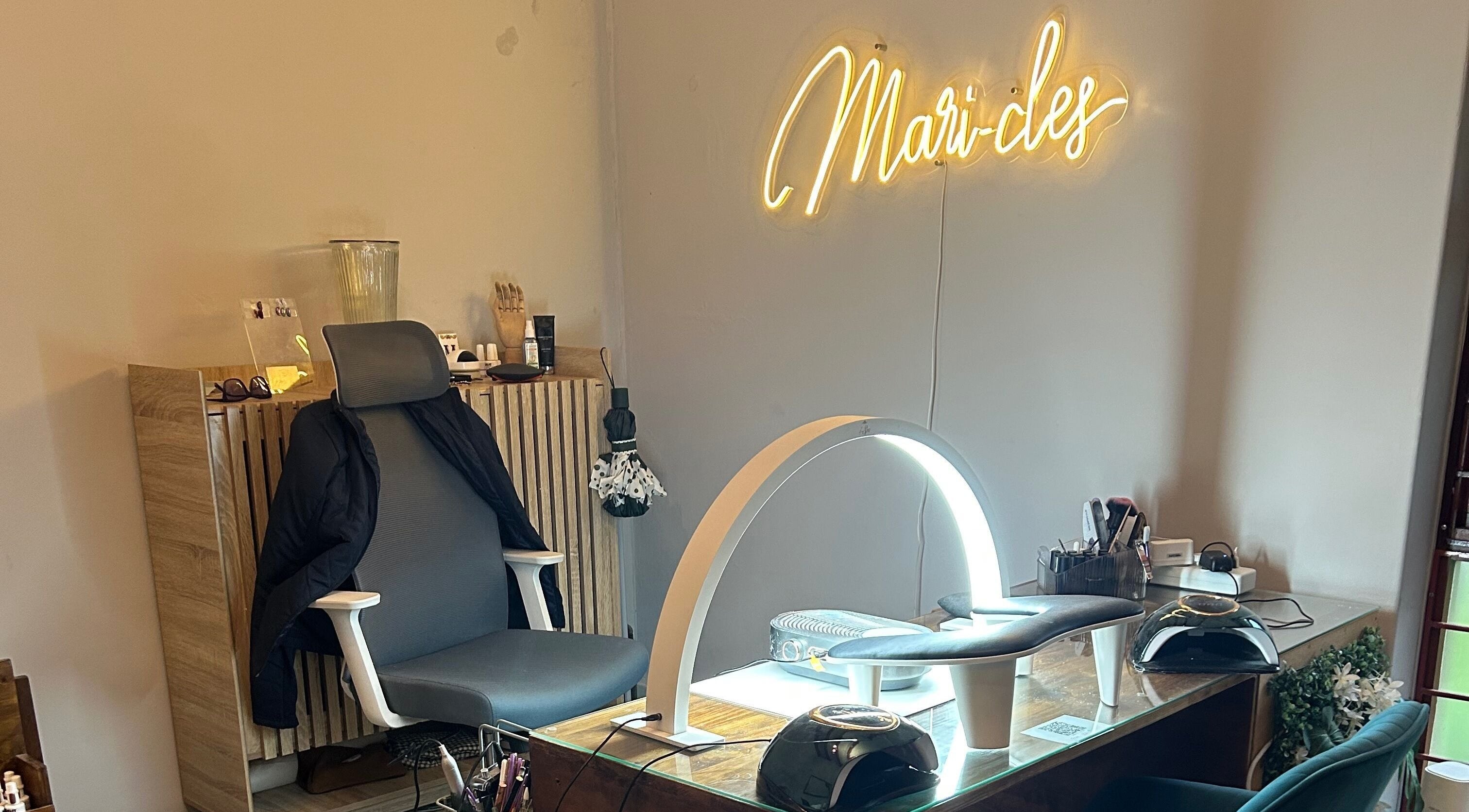 Mari-cles beauty studio in Pretoria, Gauteng, ZA showcasing a chic nail station with modern decor.
