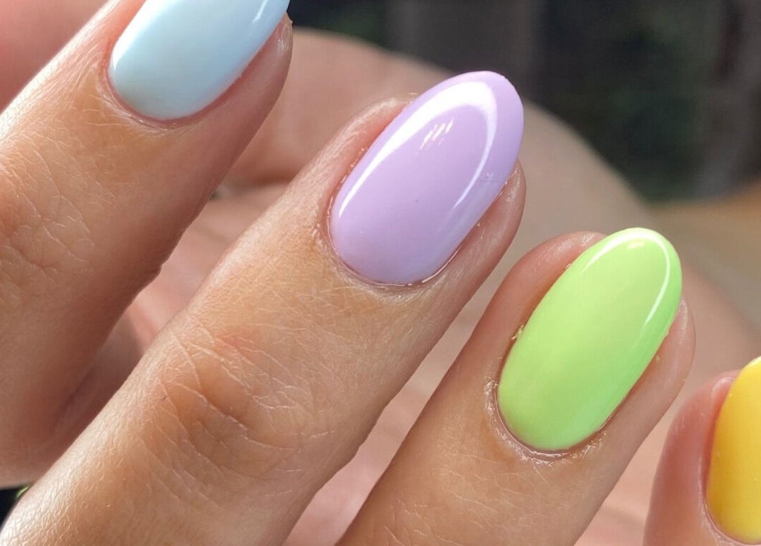Colorful pastel nails at Mari-cles, Pretoria, Gauteng, ZA, showcasing expert manicure.