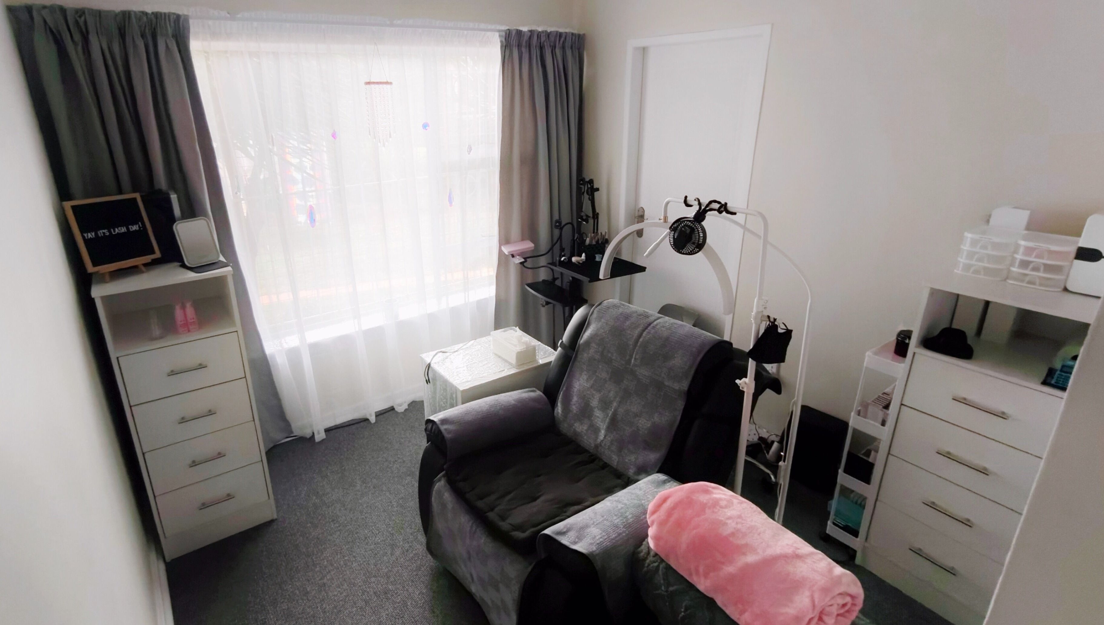 Cozy lash treatment room at Lashes by Jodene, Kempton Park, Gauteng, ZA, featuring a plush chair and calming decor.