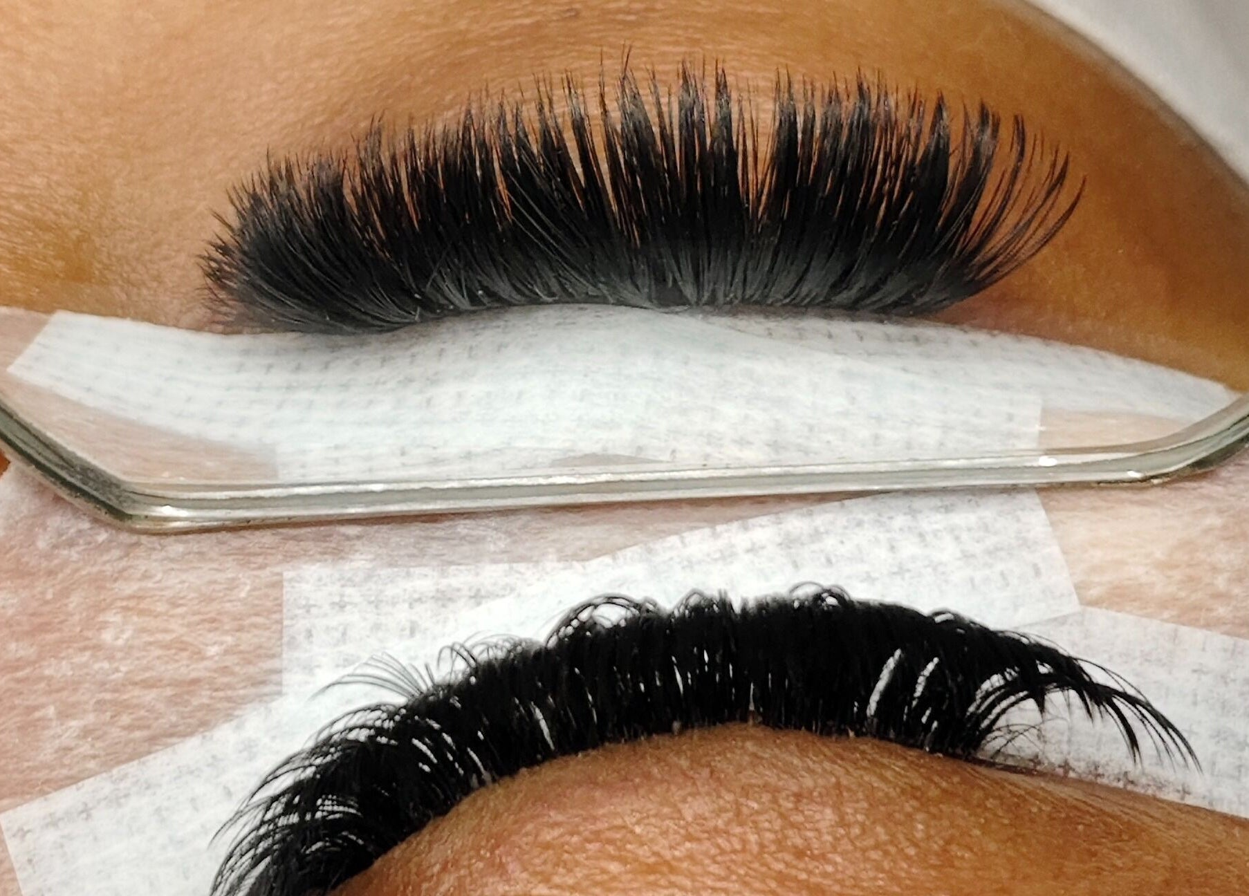 Beautiful eyelash extensions at Lashes by Jodene, Kempton Park, Gauteng, ZA, showcased through a mirror.