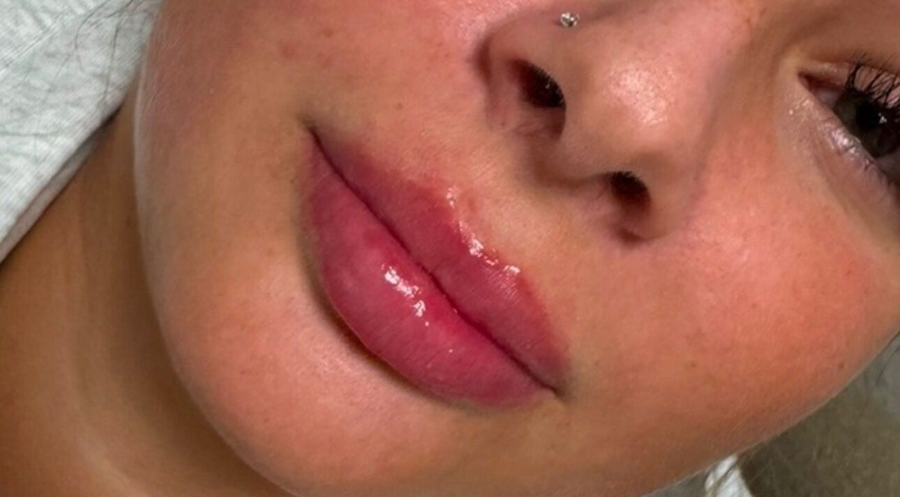 Close-up of glossy lips at S.Louise Beauty X in Markfield, England, GB highlighting vibrant care.