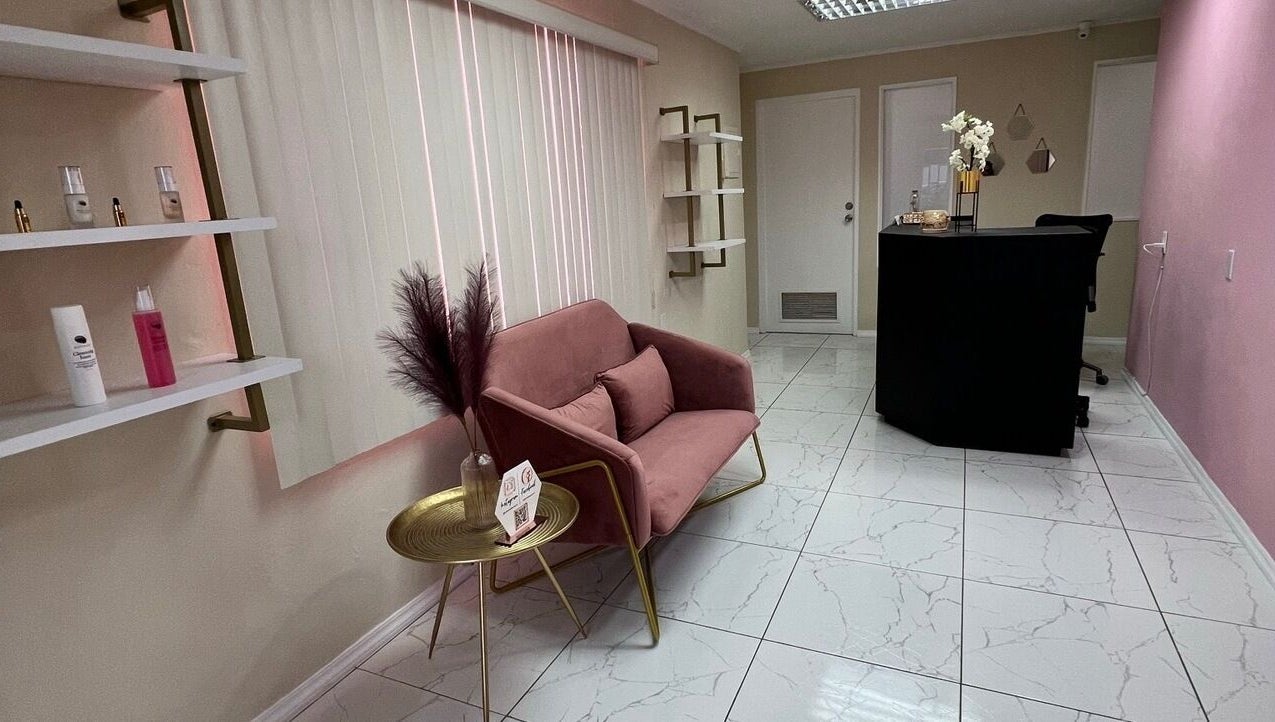 Modern reception at Ethereal Beauty, Willemstad, Curaçao with blush seating and chic decor.