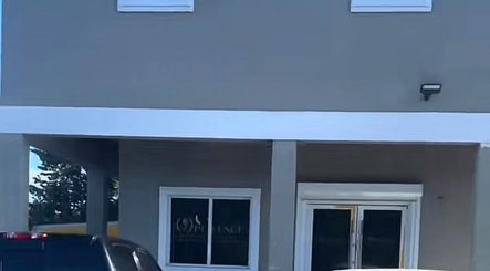Entrance of The Beauty Boss Bureau in Nassau, New Providence, BS featuring sleek modern design.