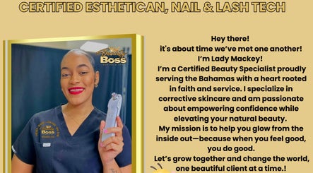 Certified esthetician at The Beauty Boss Bureau in Nassau, New Providence, BS, smiling with a skincare device.