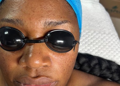 Client enjoys skincare at The Beauty Boss Bureau, Nassau, New Providence, BS, wearing protective goggles.