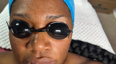 Client enjoys skincare at The Beauty Boss Bureau, Nassau, New Providence, BS, wearing protective goggles.